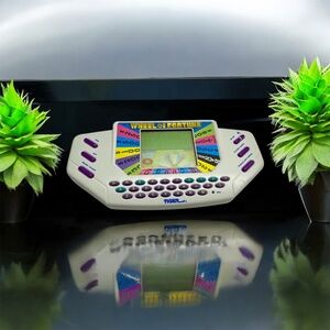 *2A The Wheel of Fortune Handheld Game 1995 Vintag Electronic Tiger Electronics